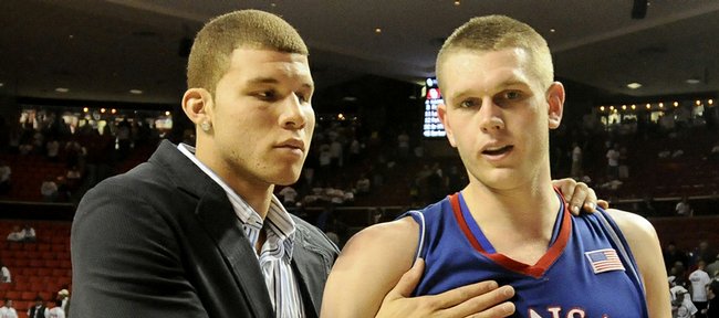 All-Big 12 first-teamer Cole Aldrich, right, walks off the court with Big 12 Player of the Year Blake Griffin of Oklahoma.