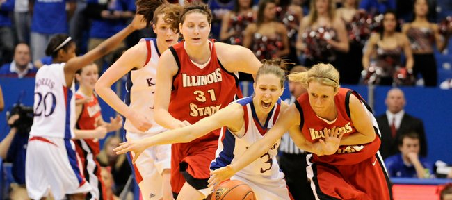 Kansas guard Ivana Catic hustles for a loose ball after stripping it from Illinois State guard Maggie Krick during the second half, Wednesday, April 1, 2009 at Allen Fieldhouse. Left are Kansas center Krysten Boogaard and Illinois State center Nicolle Lewis.