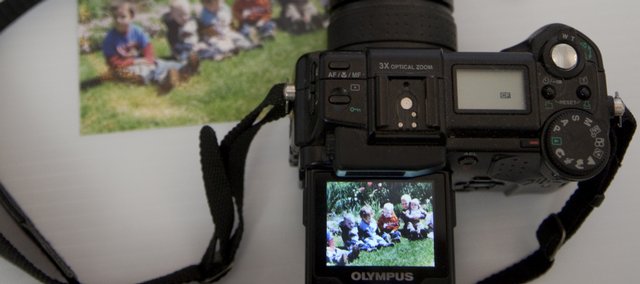 If you don’t have a print or film scanner, a digital point-and-shoot camera can give you a portable copying device to digitize old photographs. 