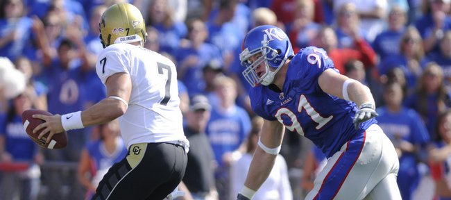 Kansas defensive end Jake Laptad swoops in to sack Colorado quarterback Cody Hawkins for a safety during the second quarter Saturday, Oct. 11, 2008 at Memorial Stadium.