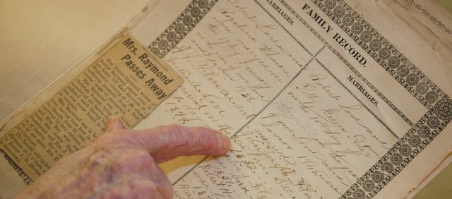 Winifred Lynch looks at the lineage documented in her family Bible. It belonged to her mother's adoptive family. Lynch hopes that she can find long-lost family members to take the Bible because she believes it should be in the possession of someone with blood ties to the people who originated the book.