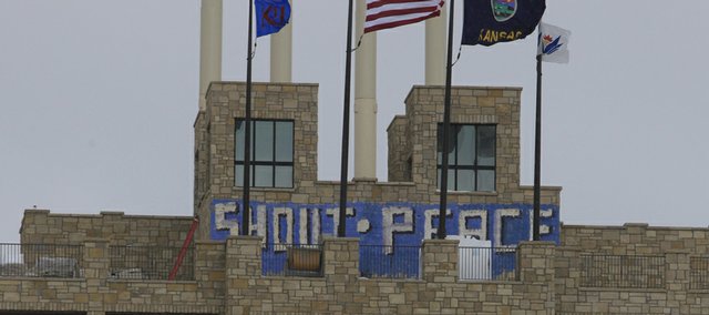 Vandals painted "shout" and "peace" on the south side of The Oread's top viewing deck over the weekend.