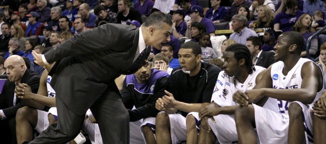 Kansas State head basketball coach Frank Martin yells at forward Curtis Kelly (24) during the first half of an NCAA second-round college basketball game against BYU, Saturday, March 20, 2010, in Oklahoma City.