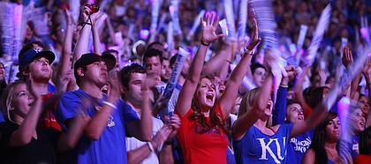 Lights flash throughout the student section as basketball fever sets in during Late Night in the Phog, Friday, Oct. 15, 2010.
