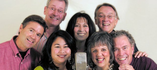 Right Between The Ears left to right : Rick Tamblyn, David Greusel, Andi Meyer, Teri Wilder, Roberta Solomon, Kip Niven, and John Jessup. The comedy troupe will perform their holiday show live this Saturday at the Kansas Public Radio Performance Studio, 1120 W. 11th St.