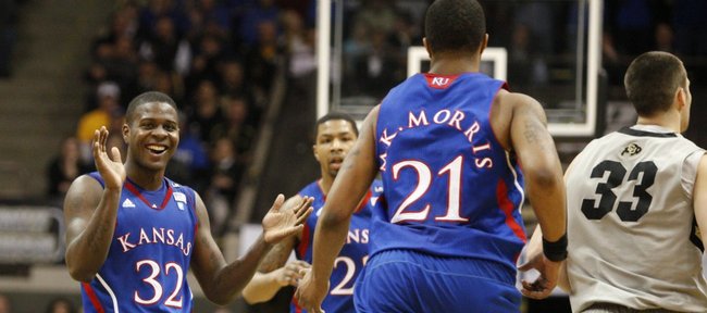 Kansas guard Josh Selby (32) celebrates with teammates Markieff Morris (21) and Marcus Morris after a KU bucket against Colorado during the second half on Tuesday, Jan. 25, 2011 at the Coors Events Center in Boulder.