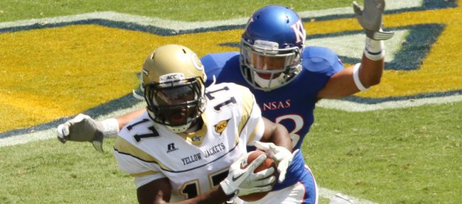 Kansas defender Tyler Patmon comes in to tackle Georgia Tech's Orwin Smith in the first half Saturday, Sept. 17, 2011 in Atlanta.