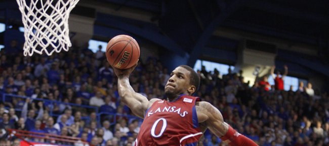Kansas forward Thomas Robinson pulls back for a dunk off a breakaway against North Dakota during the second half on Saturday, Dec. 31, 2011 at Allen Fieldhouse.