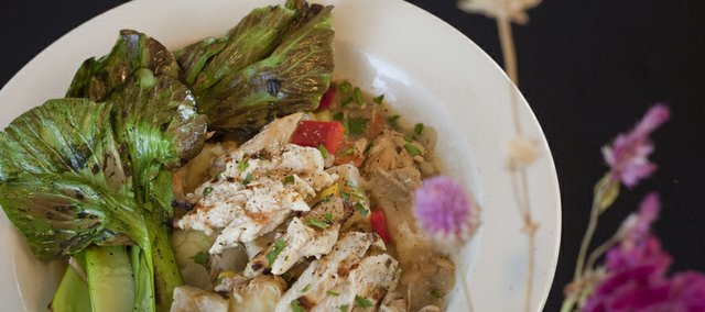 Feaster's Bistro features locally sourced ingredients in a menu of seasonal comfort foods, like this grilled chicken with dumplings and bok choy dish.