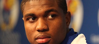 Receiver Justin McCay, a transfer from Oklahoma, listens as his teammates answer questions on Monday, Jan. 16, 2012 at the Anderson Family Football Complex.