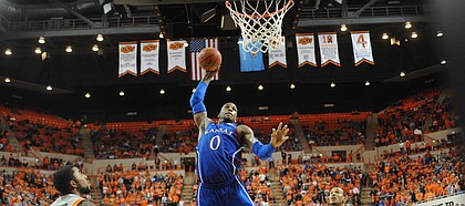 Kansas forward Thomas Robinson goes up for a dunk against Oklahoma State on Monday, Feb. 25, 2012, at Gallagher-Iba Arena in Stillwater, Okla.