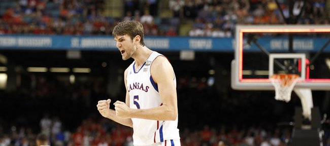 Kansas center Jeff Withey pumps his fist after a Jayhawk bucket to end the half against Ohio State during the first half on Saturday, March 31, 2012 at the Superdome.