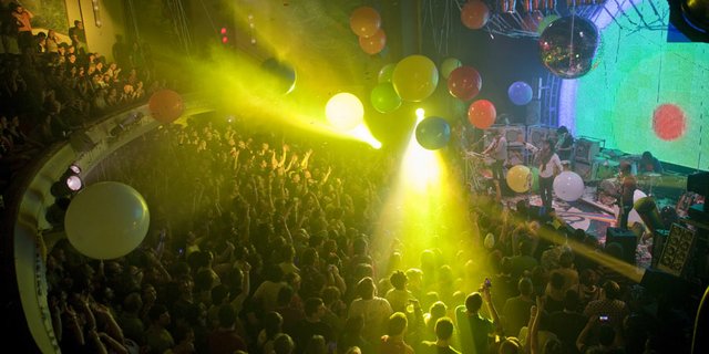 
An explosion of light, balloons and confetti fall on a full house Friday at Liberty Hall as the The Flaming Lips kicked off a Liberty Hall 100-year anniversary celebration concert. 