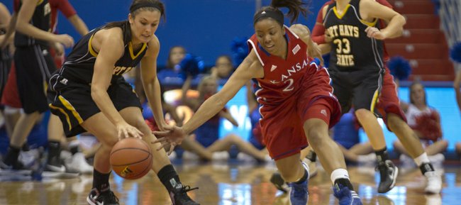 Kansas' CeCe Harper, right, swipes the ball away from Katelyn Edwards during Kansas' final exhibition game against Fort Hays State University, Sunday, Nov. 4, 2012 at Allen Fieldhouse. The Jayhawks open the season against Idaho State Sunday at 2 p.m.