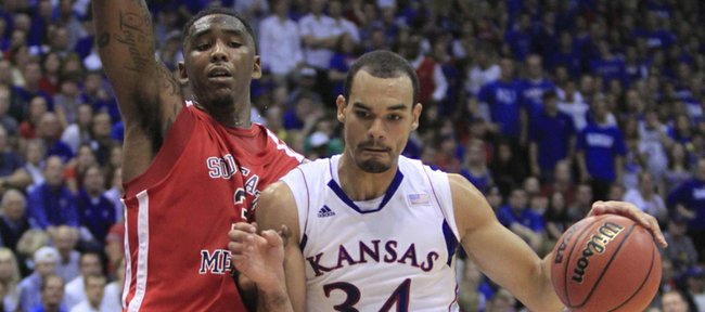 KU forward Perry Ellis (34) drives against Southeast Missouri State's Tyler Stone on Friday at Allen Fieldhouse.