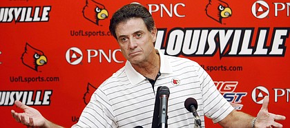 In this Aug. 26, 2009, file photo, Louisville basketball coach Rick Pitino makes a point during a news conference in Louisville, Ky.
