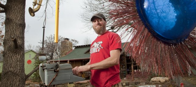 Nick Schmiedeler has a yard and house decorated with junkyard treasures and other assorted stuff. Schmiedeler's home is one of two Lawrence residences scheduled to be featured on upcoming episodes of HGTV's "Home Strange Home."