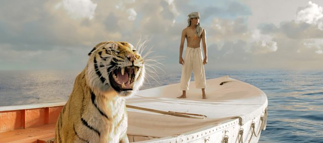 This film image released by 20th Century Fox shows Suraj Sharma in a scene from “Life of Pi.”