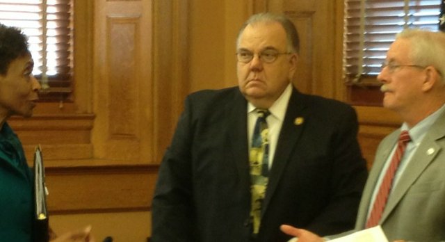 Kansas University Chancellor Bernadette Gray-Little speaks with state Sen. Tom Arpke, R-Salina in February. In the center is state Sen. Steve Abrams, R-Arkansas City.