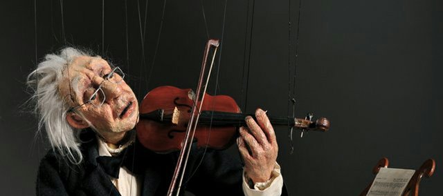 A virtuoso violinist is one of the 15 marionettes used by Joseph Cashore in his performances. See Cashore in action this weekend at the Lied Center.
