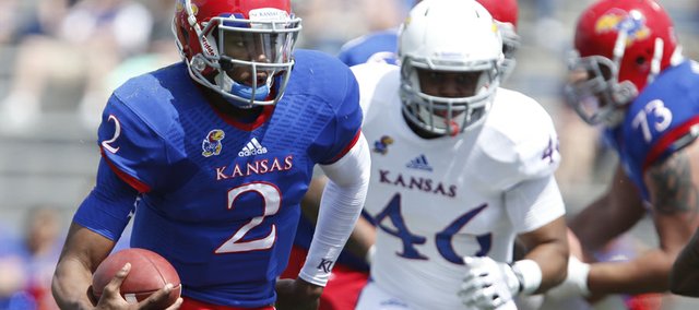 Blue Team quarterback Montell Cozart scrambles in for a touchdown against the White Team during the second half of the Kansas Spring Game on Saturday, April 12, 2014 at Memorial Stadium. Nick Krug/Journal-World Photo