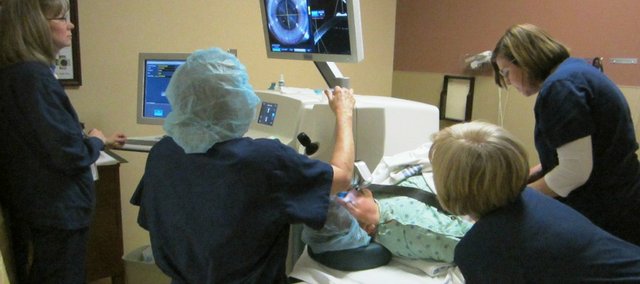 Dr. Mary Pat Lange of Lawrence Eye Care Associates uses the LenSx laser during cataract removal surgery at Lawrence Memorial Hospital.