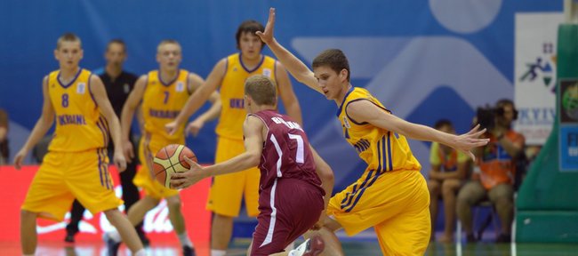 Sviatoslav Mykhailiuk of Ukraine competes during the U16 Eurobasket 2013 first-round match between Ukraine and Latvia at Palace of Sport in Kiev, Ukraine, on Aug. 8, 2013.