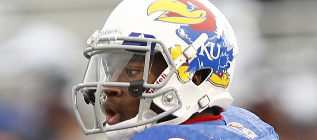 KU sophomore quarterback Montell Cozart (2) looks for a receiver in the first half against Central Michigan on Saturday, September 20, 2014 at Memorial Stadium.
