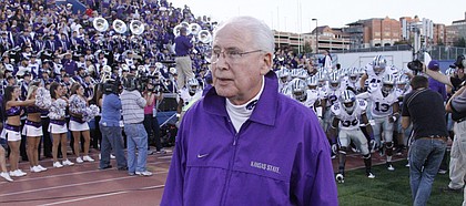 Kansas State head coach Bill Snyder leads his Wildcats on to the field before taking on Kansas Thursday, Oct. 14, 2010 at Memorial Stadium.