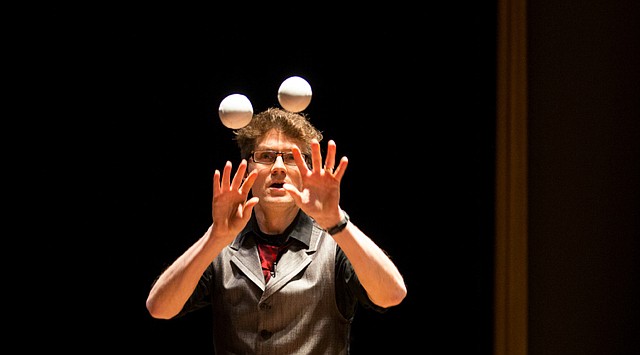 World yo-yo champion and juggler Mark Hayward catches balls catapulted by a giant mouse trap triggered by a dart from a blow gun as he performs a trick for the audience during his TEDx Lawrence talk in March. If you missed his show, you can see it on video tonight at Theatre Lawrence.