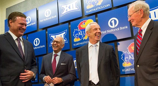 Kansas head basketball coach Bill Self, and former coaches Larry Brown, Roy Williams and Ted Owens have a laugh while talking shop in preparation for the 60th Anniversary celebration of Allen Fieldhouse on Monday, Oct. 27, 2014.