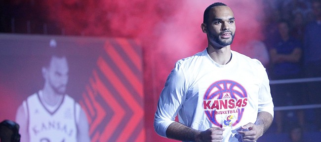 Kansas senior forward Perry Ellis takes the court during the player introductions during Late Night in the Phog, Friday, Oct. 9, 2015 at Allen Fieldhouse.