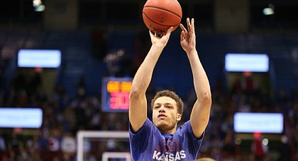 Kansas junior guard Brannen Greene takes pre-game shots before the Jayhawks take on Oklahoma, on Jan. 4, 2016, at Allen Fieldhouse.