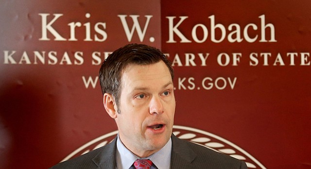 Kansas Secretary of State Kris Kobach speaks during a news conference Tuesday, Feb. 17, 2015, in Topeka.