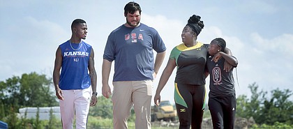 From left, Kansas University products Kyle Clemons, Mason Finley, Daina Levy, and Zainab Sanni walk the track on Wednesday, July 13, 2016, at Rock Chalk Park. The four are headed to the Rio Olympics.