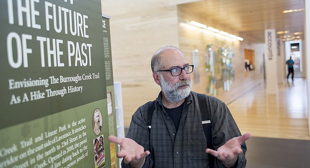 Henry Fortunato is the curator behind the Lawrence Public Library's new "A Hike Through History" exhibit, which will be displayed in the library atrium beginning Monday. 
