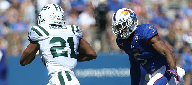 Kansas linebacker Marcquis Roberts (5) chases after Ohio running back Maleek Irons (21) during the first quarter on Saturday, Sept. 10, 2016 at Memorial Stadium.