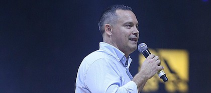 Kansas women's basketball coach Brandon Schneider addresses the crowd during Late Night in the Phog on Saturday, Oct. 1, 2016 at Allen Fieldhouse.