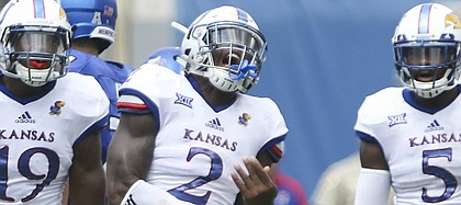 Kansas defensive end Dorance Armstrong Jr. (2) celebrates after a tackle for a loss during the second quarter on Saturday, Sept. 17, 2016 at Liberty Bowl Memorial Stadium in Memphis, Tenn.