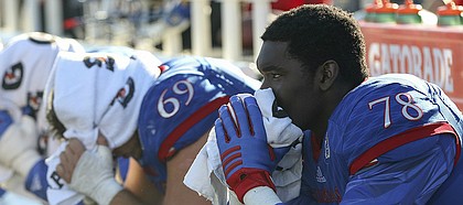 Kansas offensive lineman Mesa Ribordy (69) and Hakeem Adeniji (78) watch the closing seconds of the Jayhawks 31-24 loss to Iowa State, Saturday, Nov. 12 at Memorial Stadium.