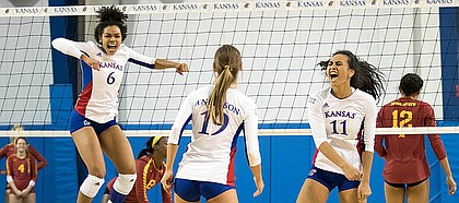 Kansas freshman Zoe Hill (6), left, senior Maggie Anderson and junior setter Ainise Havili celebrate a point against Iowa State on Saturday, Nov. 19, 2016 at Horejsi.