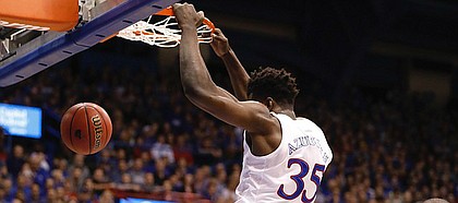 Kansas freshman Udoka Azubuike finishes a dunk during the first half against UNC Asheville on Friday, Nov. 25, at Allen Fieldhouse.