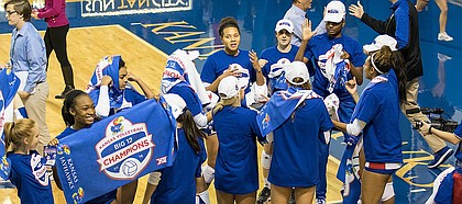 Kansas volleyball players try on their Big 12 Champions hats and shirts after a five-set victory against Iowa State on Saturday, Nov. 19, 2016 at Horejsi Center. The Jayhawks won in five sets, clinching a Big 12 title.