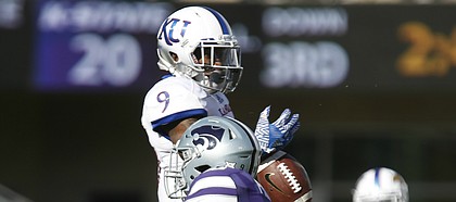 Kansas safety Fish Smithson (9) breaks up a pass to Kansas State wide receiver Byron Pringle (9) during the quarter, Saturday, Nov. 26, 2016 at Bill Snyder Family Stadium.