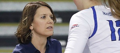 Creighton head volleyball coach Kirsten Bernthal Booth directs her team in the Bluejays match against University of Northern Iowa in the first round of the NCAA women’s volleyball tournament Thursday, Dec. 1, at Horejsi Family Athletics Center.