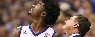 Kansas guard Josh Jackson (11) and Kansas head coach Bill Self watch the replay of a foul called on Jackson during the second half, Saturday, Jan. 21, 2017 at Allen Fieldhouse.