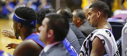 Kansas forward Landen Lucas shows his frustration as he and the Jayhawks' bench watch the final minute against West Virginia, Tuesday, Jan. 24, 2017 at WVU Coliseum.