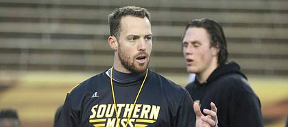 Former Southern Miss and UAB strength and conditioning coach Zac Woodfin was named Kansas football's director of strength and conditioning Feb. 23, 2017.