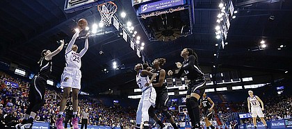 Kansas forward Caelynn Manning-Allen (25) puts up a shot to score in the Jayhawks loss to the Wildcats Saturday, Feb. 25, at Allen Fieldhouse.