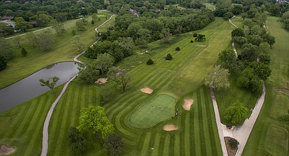 In this file photo from May 9, 2016, golfers gather at the ninth hole on the public side of Alvamar Golf Course.